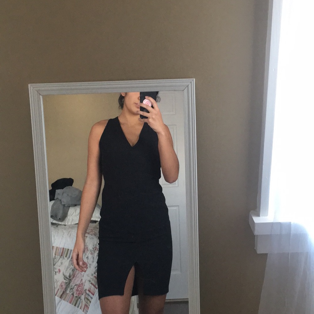 Mid length black body con dress